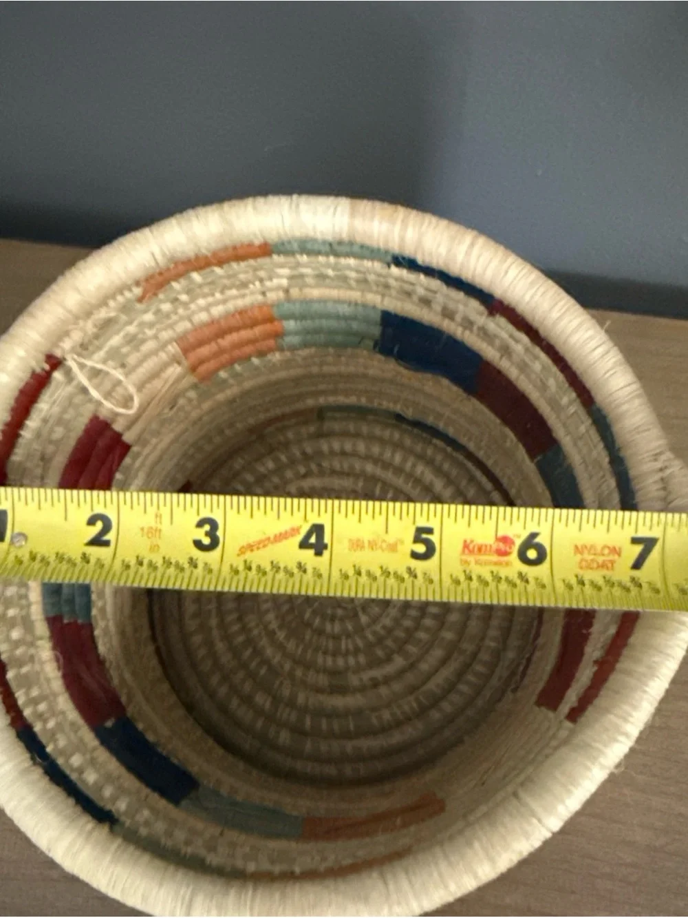 Handwoven Natural Basket with Red and Blue Accents